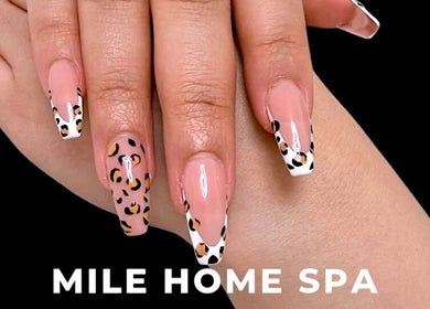 Leopard-patterned French nails at Mile Home Spa, Abu Dhabi, Abu Dhabi, AE.