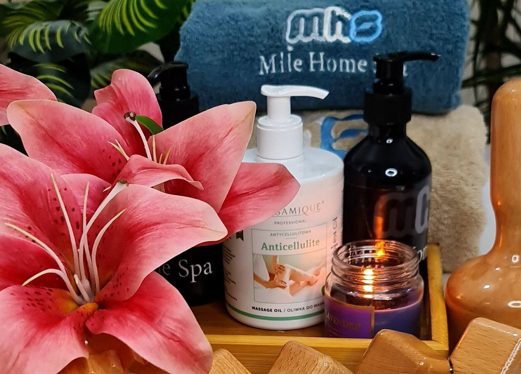 Luxurious spa items and flowers at Mile Home Spa, Abu Dhabi, Abu Dhabi, AE enhance relaxation.