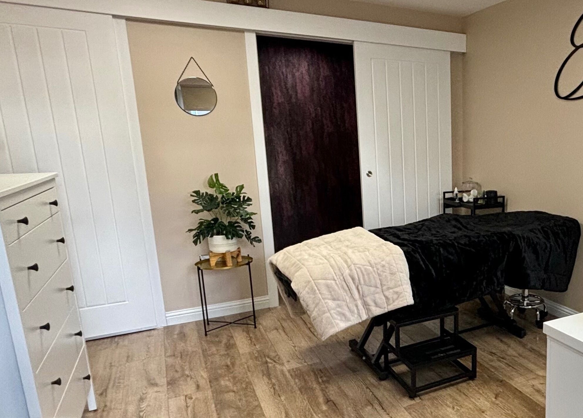 Relaxing therapy room at Elements of Beauty, Fallin, Scotland, GB, featuring cozy treatment bed.