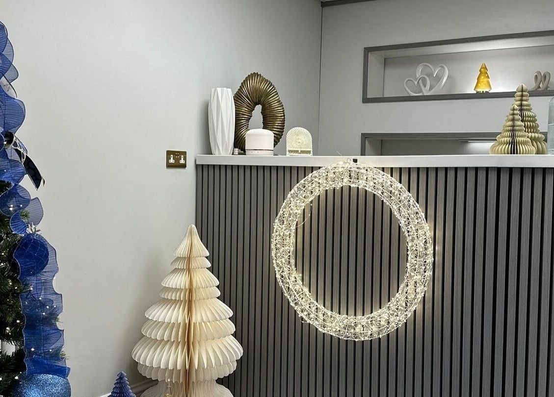 Clinic 01 reception with festive decor, East Kilbride, Scotland, GB.