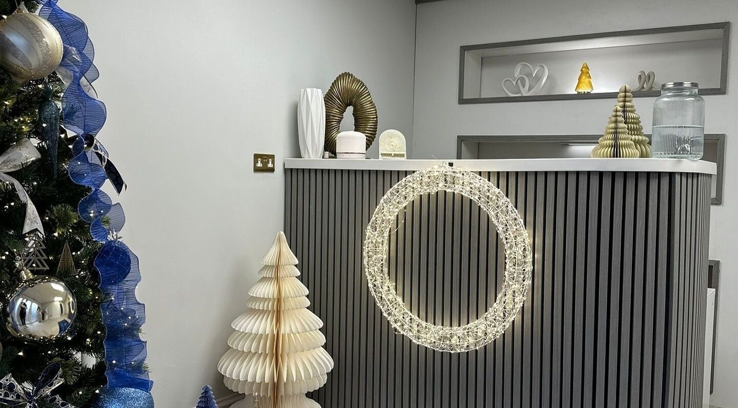 Clinic 01 reception with festive decor, East Kilbride, Scotland, GB.