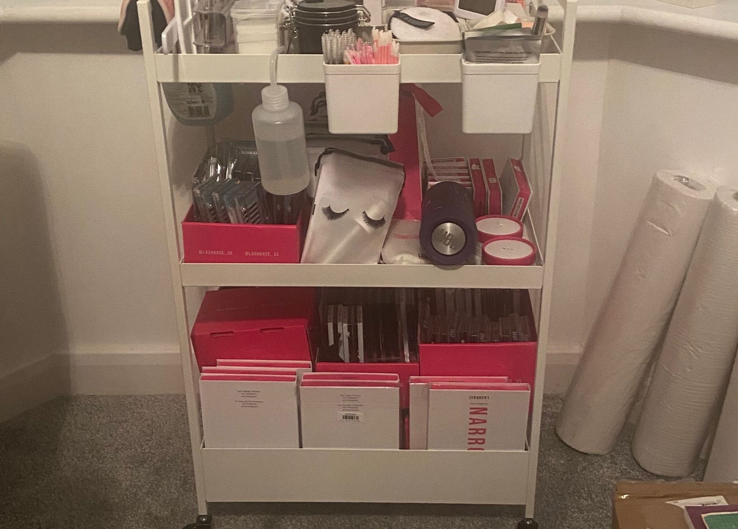 Beauty supplies cart at CaliKo.Beauty in Ashton-under-lyne, England, GB, featuring neatly organized products.