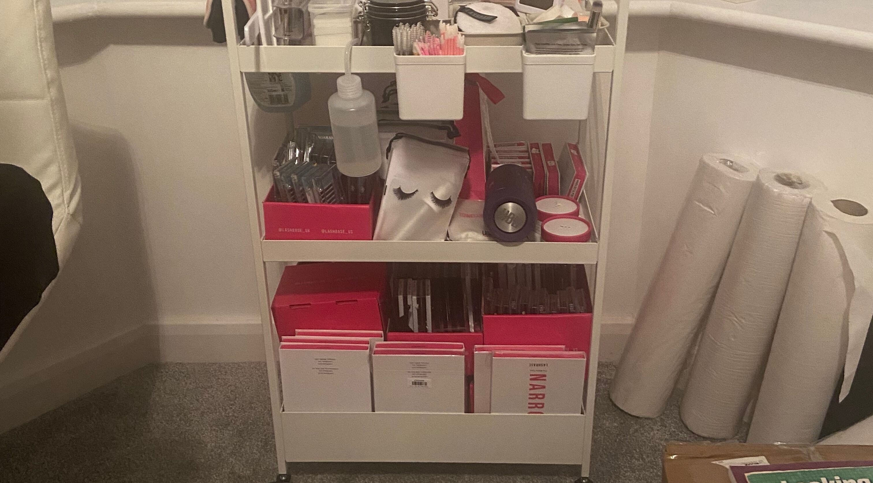 Beauty supplies cart at CaliKo.Beauty in Ashton-under-lyne, England, GB, featuring neatly organized products.