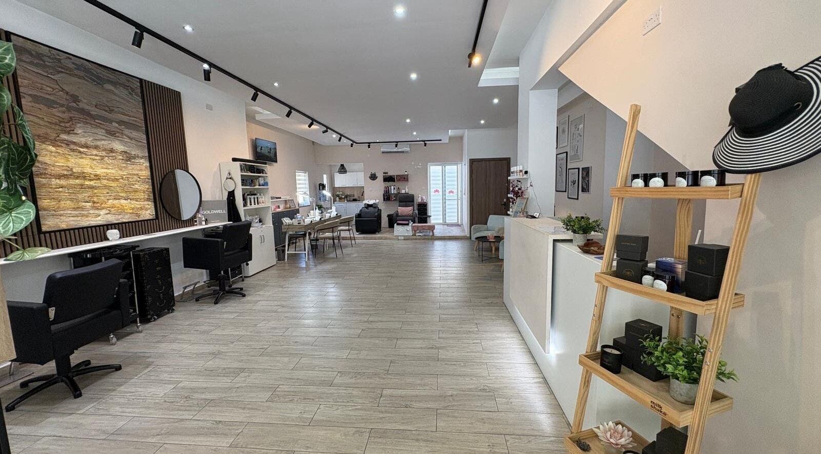 Sleek interior of Lotus Hair and Nail Salon, Il-mellieħa, MT, showcasing a chic and modern design.