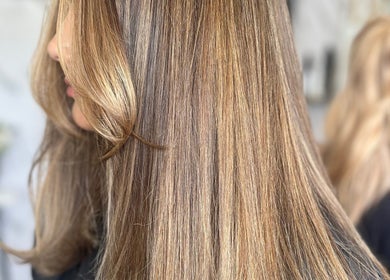 Glossy brunette hair shine at Refine Hair and Beauty, Plymouth, England, GB enhancing salon style.