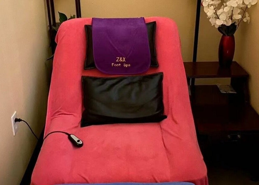 Relaxing spa chair at Z & X Foot Spa in Lutz, Florida, US, showcasing comfort and tranquility.