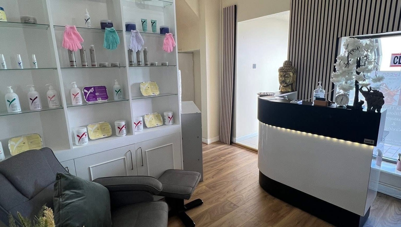 Inviting interior of Lanna Thai Massage & Waxing in Cardiff, Wales, GB with elegant decor and wellness products.