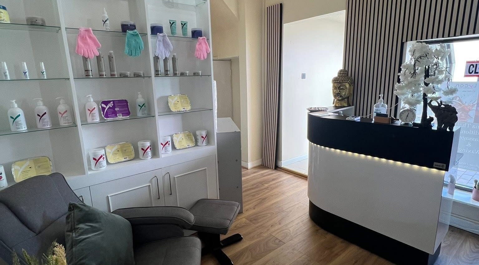 Inviting interior of Lanna Thai Massage & Waxing in Cardiff, Wales, GB with elegant decor and wellness products.