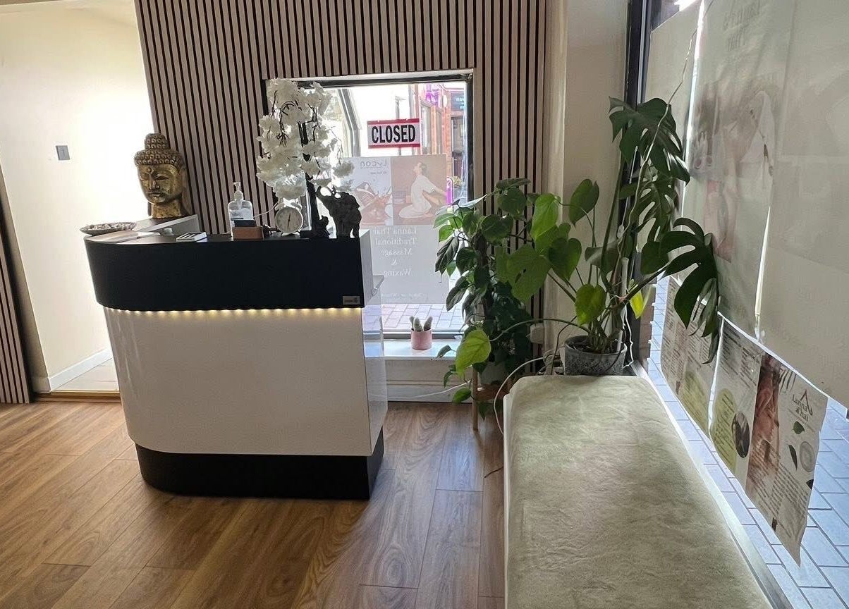Reception area of Lanna Thai Massage & Waxing in Cardiff, Wales, GB featuring elegant decor and tranquil ambiance.
