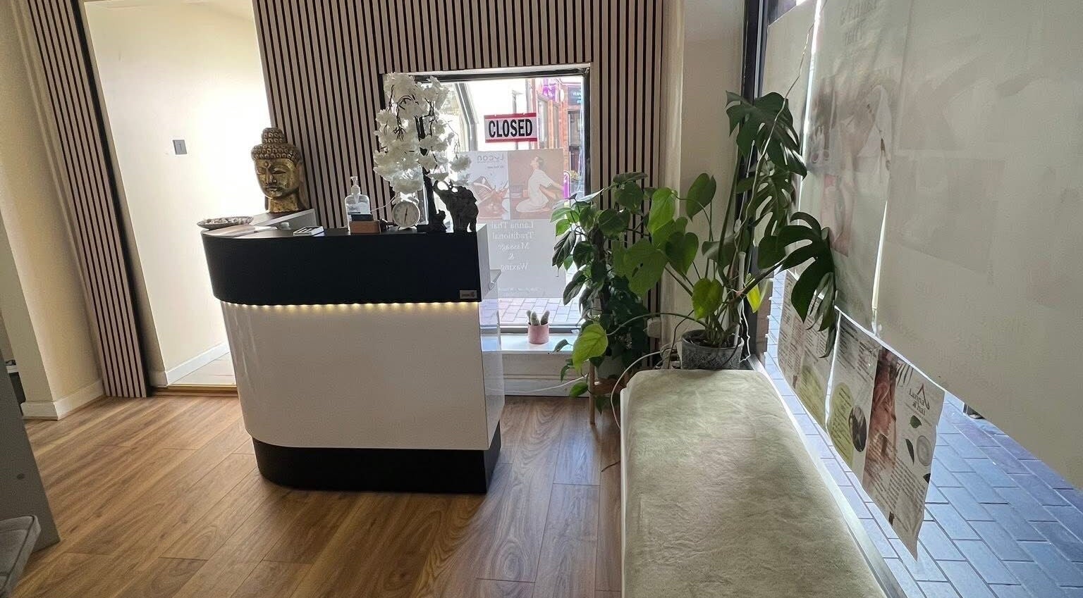 Reception area of Lanna Thai Massage & Waxing in Cardiff, Wales, GB featuring elegant decor and tranquil ambiance.