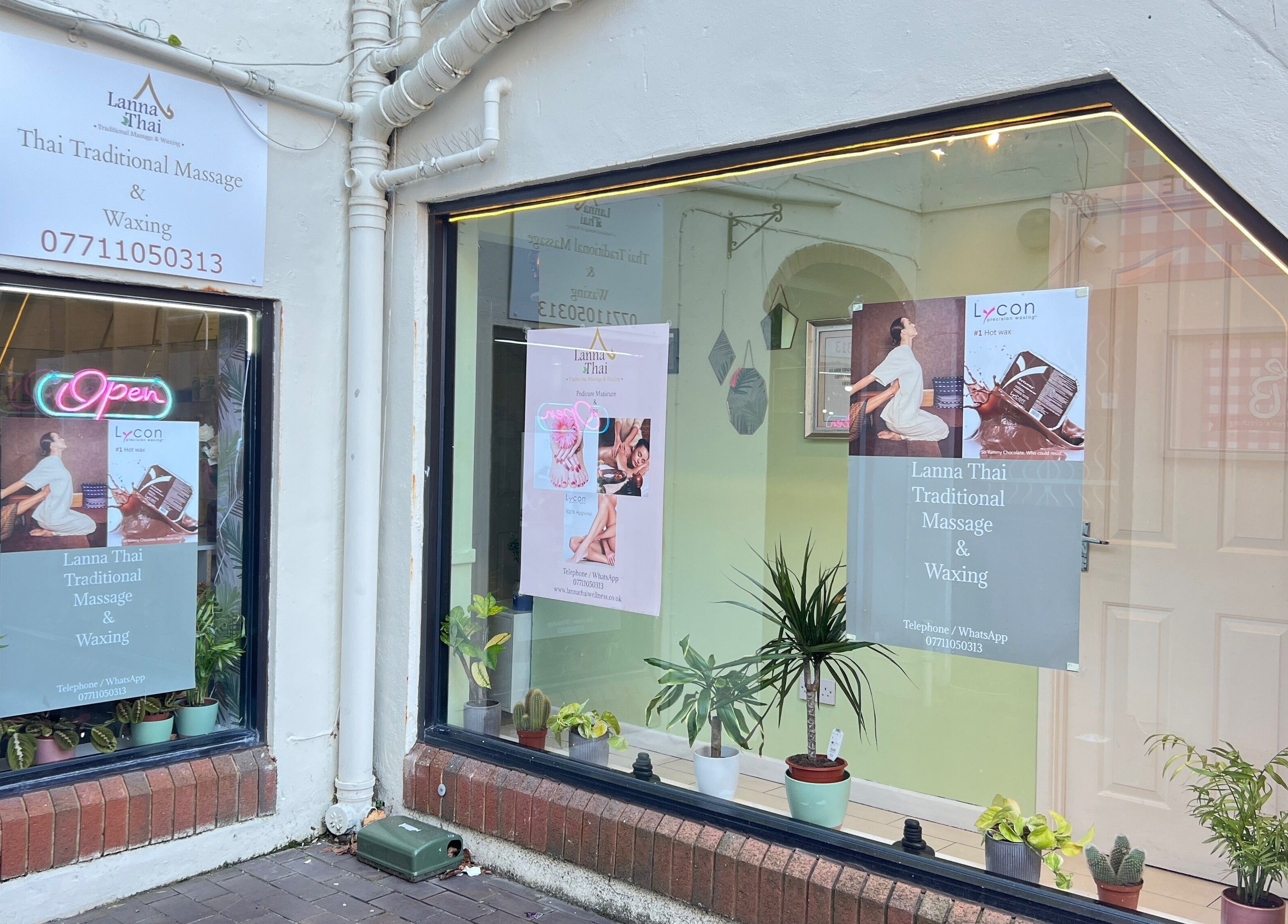 Front view of Lanna Thai Massage & Waxing in Cardiff, Wales, GB, featuring welcoming window displays.