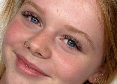 Close-up of a smiling woman with enhanced lashes at Be Serene Beauty, Tootgarook, Victoria, AU.