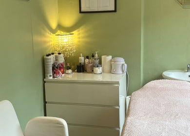 Cozy treatment room at 1 Love Enhancink @Studio55, Urmston, England, GB, featuring a serene setup and soft lighting.