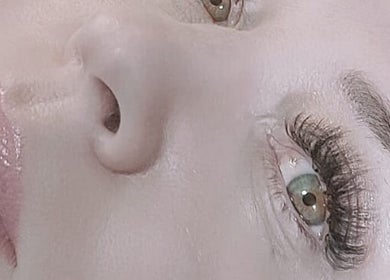 Enhanced lashes at Lilac Beauty Skin Brows Lashes in Cape Town, Western Cape, ZA. Close-up of styled eyelashes.