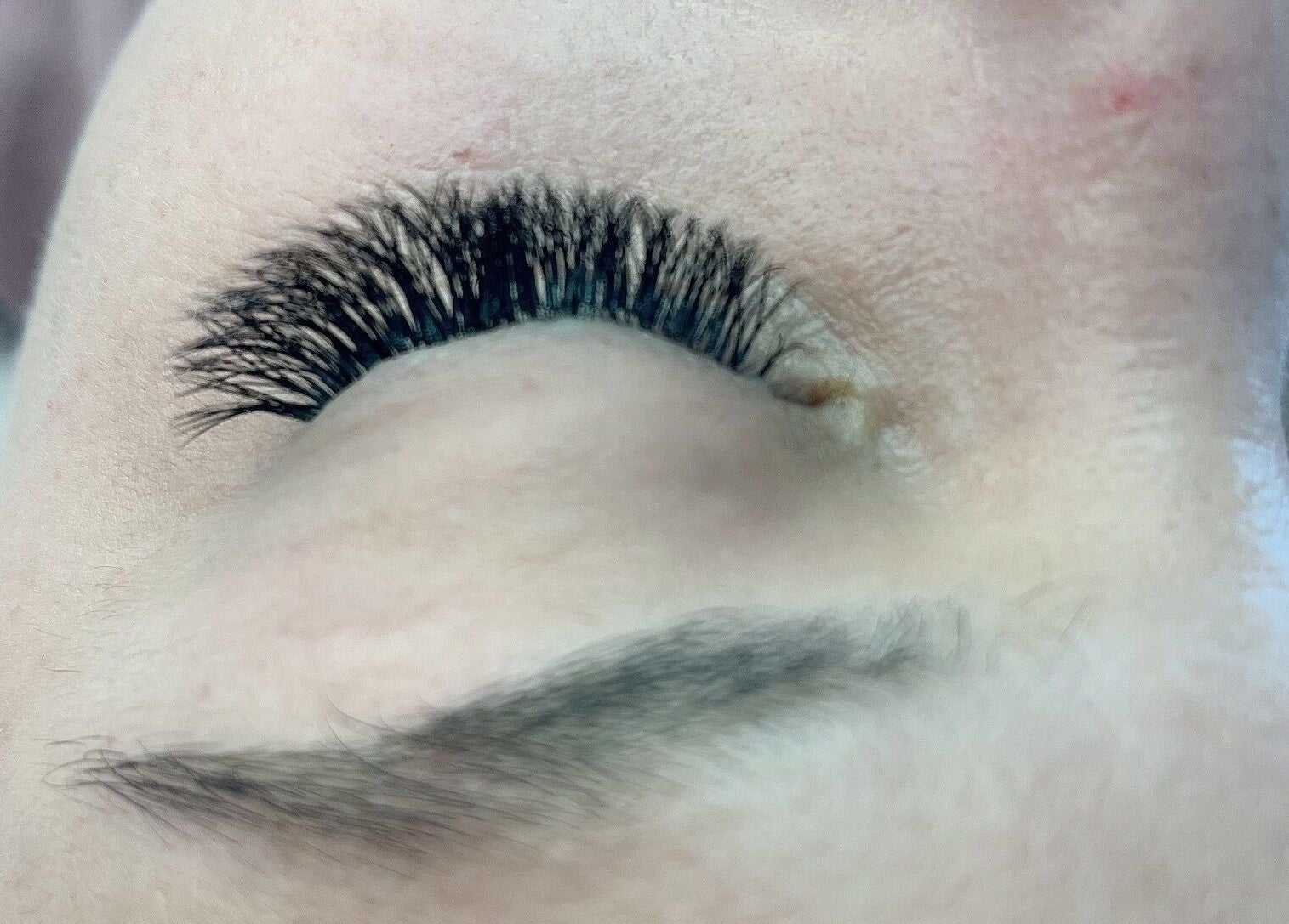 Close-up of expertly applied eyelash extensions at Lilac Beauty Skin Brows Lashes, Cape Town, Western Cape, ZA.