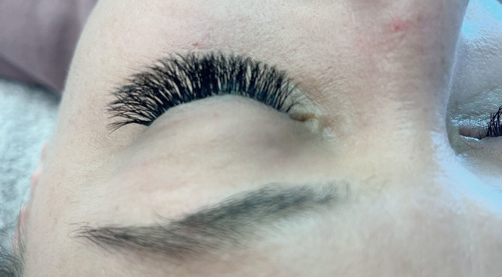 Close-up of expertly applied eyelash extensions at Lilac Beauty Skin Brows Lashes, Cape Town, Western Cape, ZA.