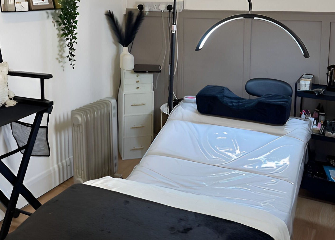 Relaxing beauty treatment room at Charlchapman Beauty Studios, Redditch, England, GB, featuring a therapy bed and decor.