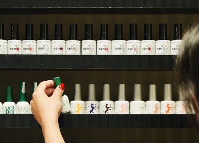 Wide selection of nail polishes at M and N Nail Spa, Dubai, AE, offering vibrant color options.