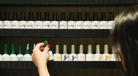 Wide selection of nail polishes at M and N Nail Spa, Dubai, AE, offering vibrant color options.