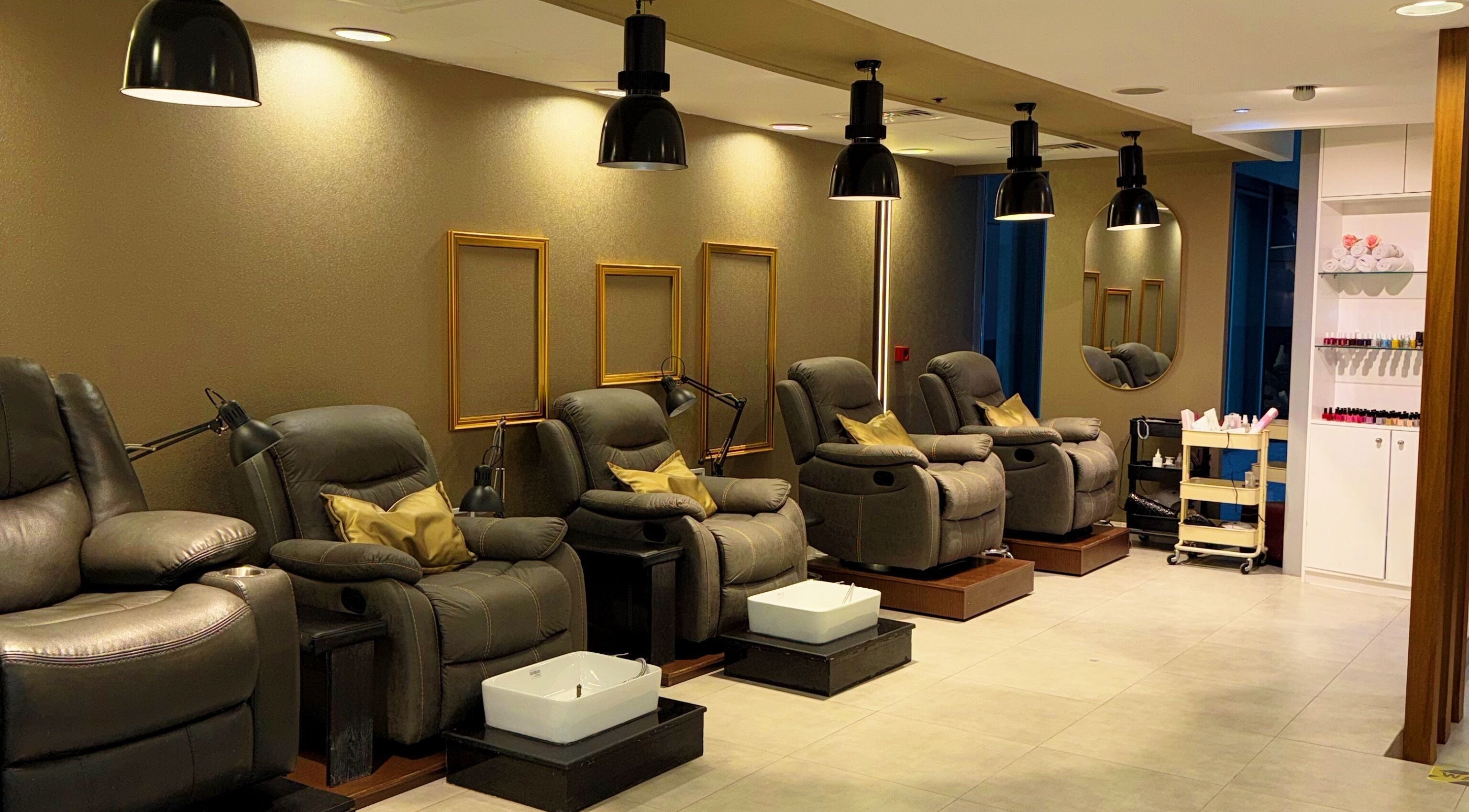 Elegant pedicure chairs at M and N Nail Spa, Dubai, AE for a relaxing foot treatment experience.