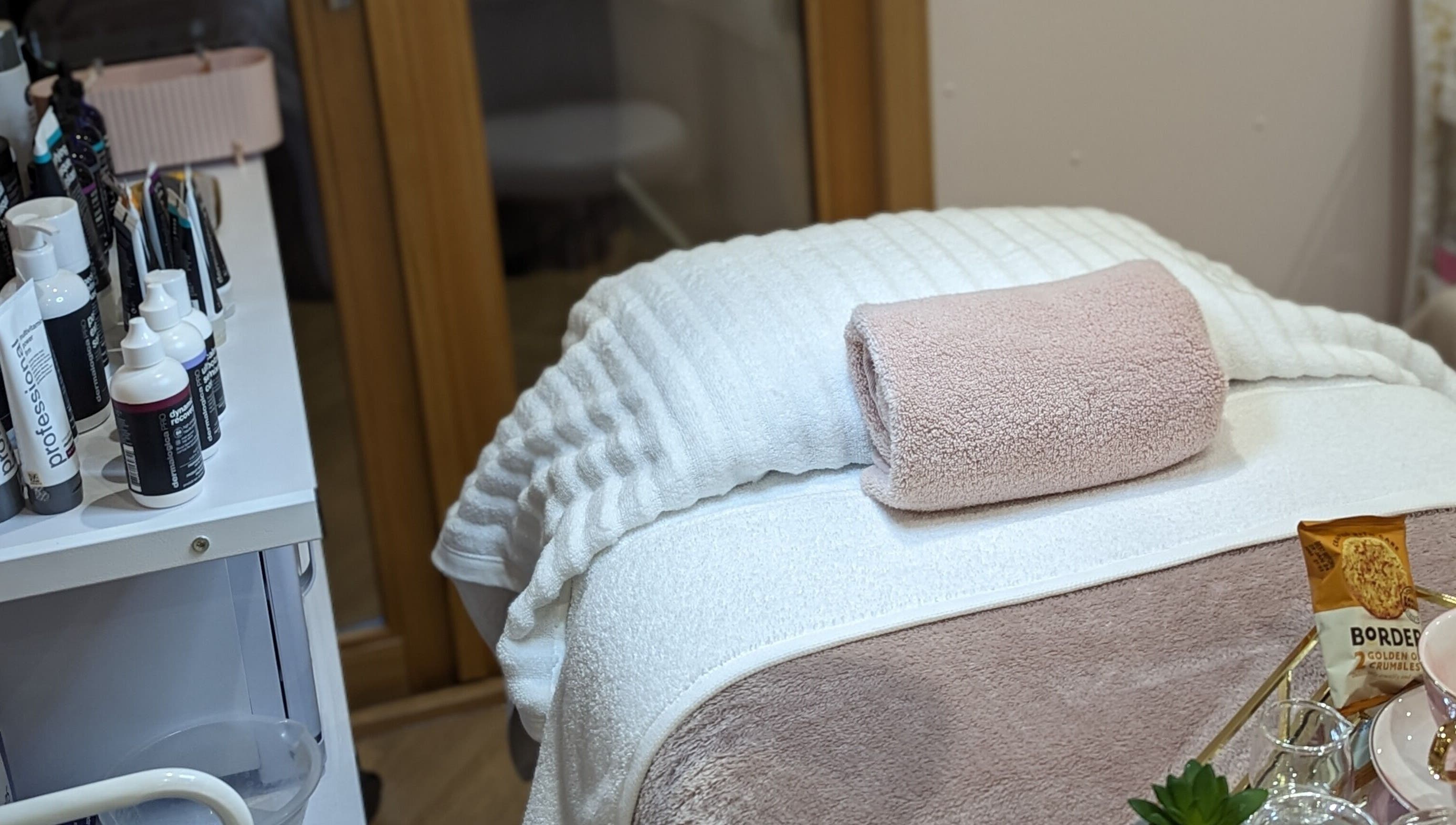 Cozy treatment area at GBM Beauty Aesthetics, Ruislip, England, GB, showcasing elegant setup and professional products.