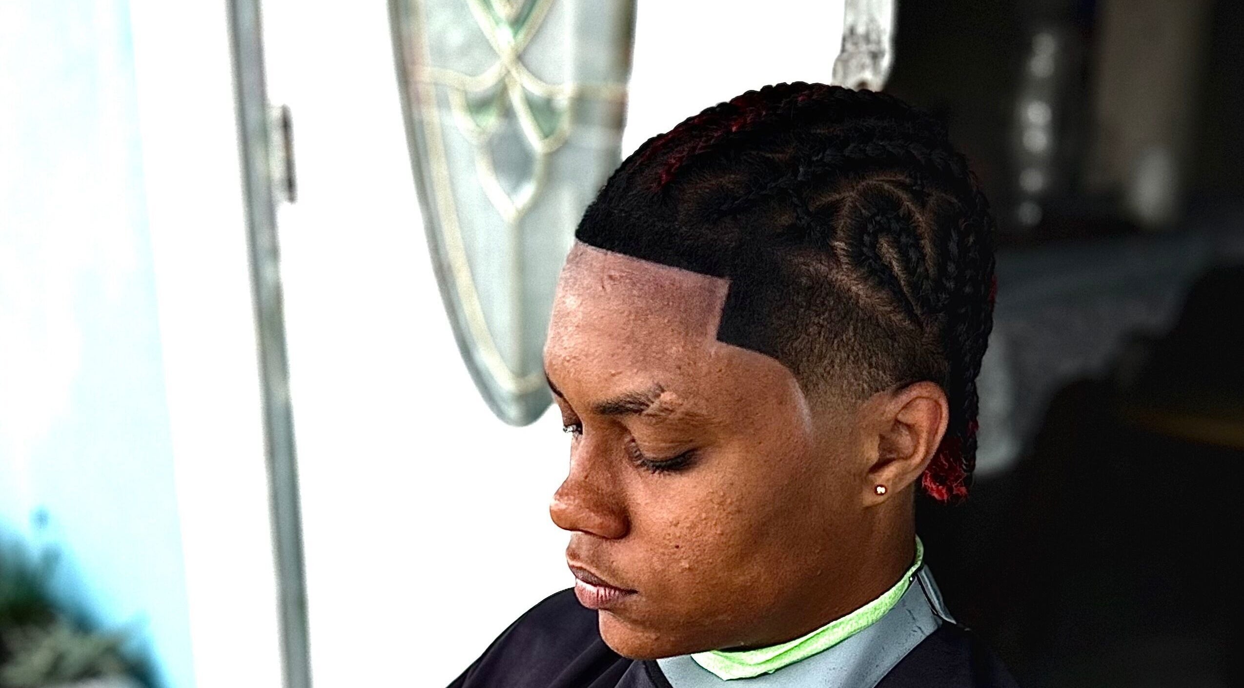 Close-up of a stylish braid at CliffCutz, St.patricks, Christ Church, BB, showcasing expert hairstyling.