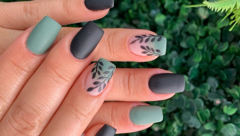 Stylish matte nail art with leaf designs at Dezz Nails and Glam Studio, Johannesburg, Gauteng, ZA.