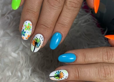 Colorful nail art at Dezz Nails and Glam Studio, Johannesburg, Gauteng, ZA showcasing unique designs.