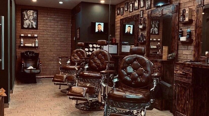 Silla de barbería clásica en The Men’s Time, Xalapa-enríquez, Veracruz, MX con diseño vintage.