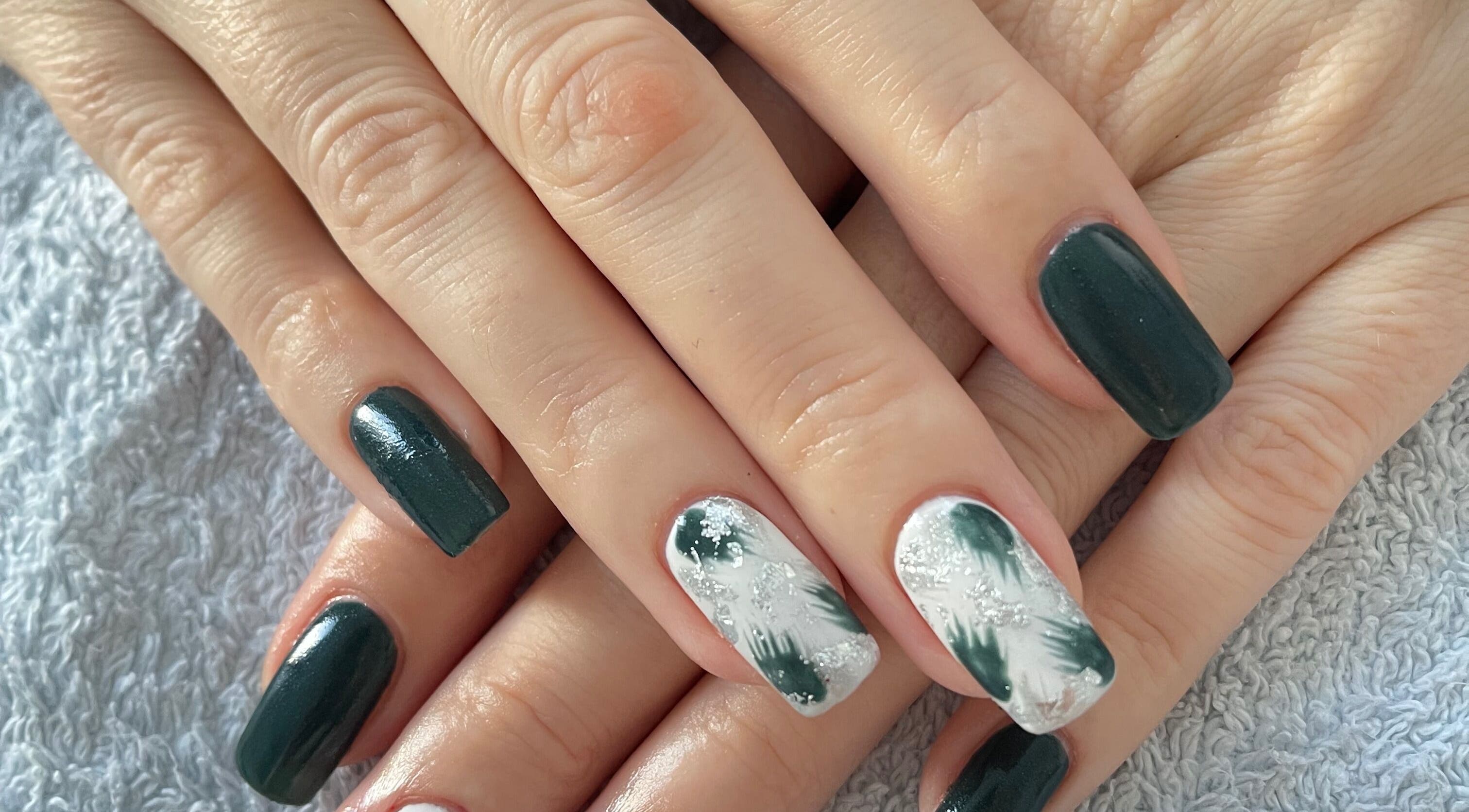 Chic green and white nail art at Taylor Fenton Cosmetics, Whitstable, England, GB.