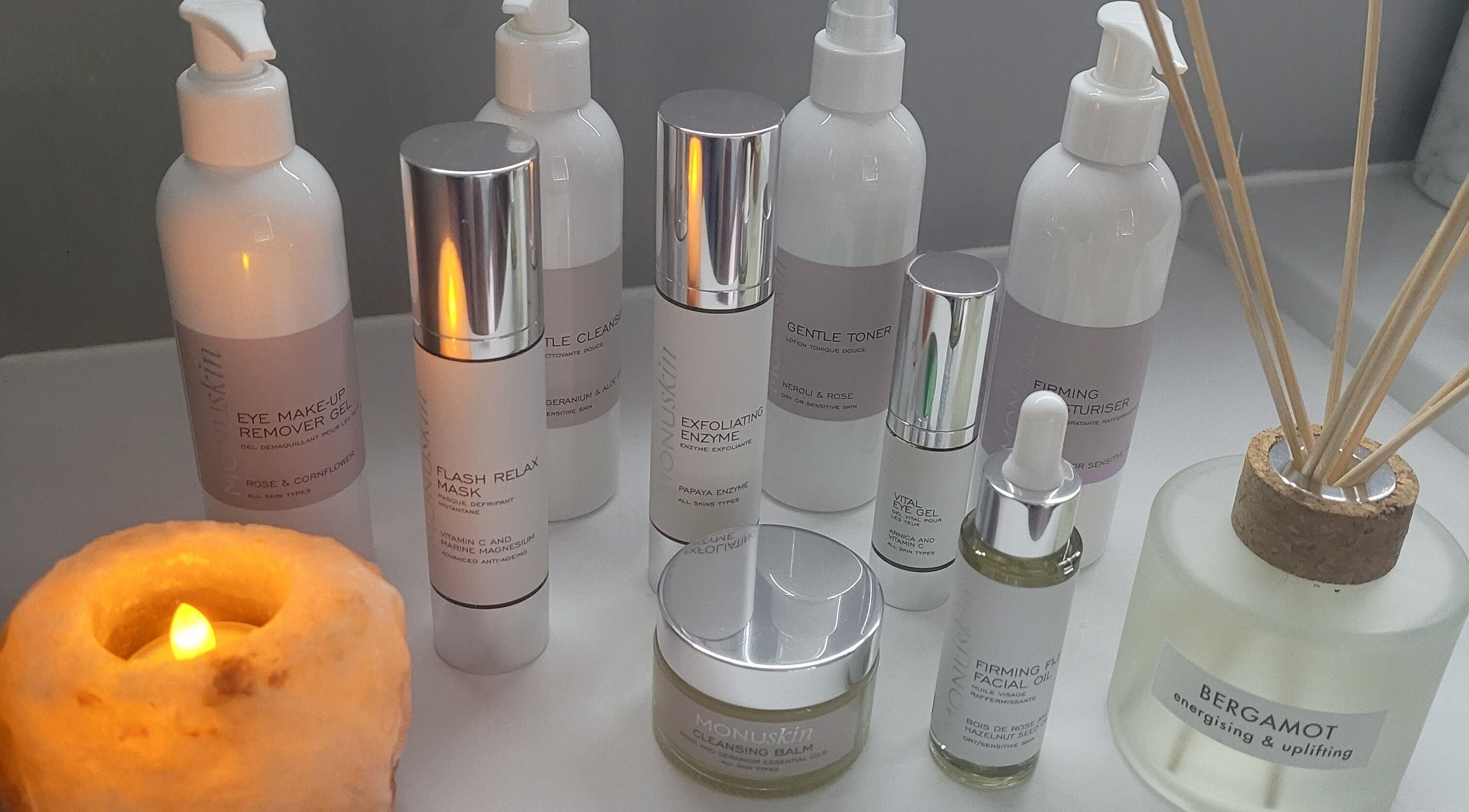 Luxurious skincare products at Nirvana Beauty & Massage, Bonnybridge, Scotland, GB create a serene atmosphere.