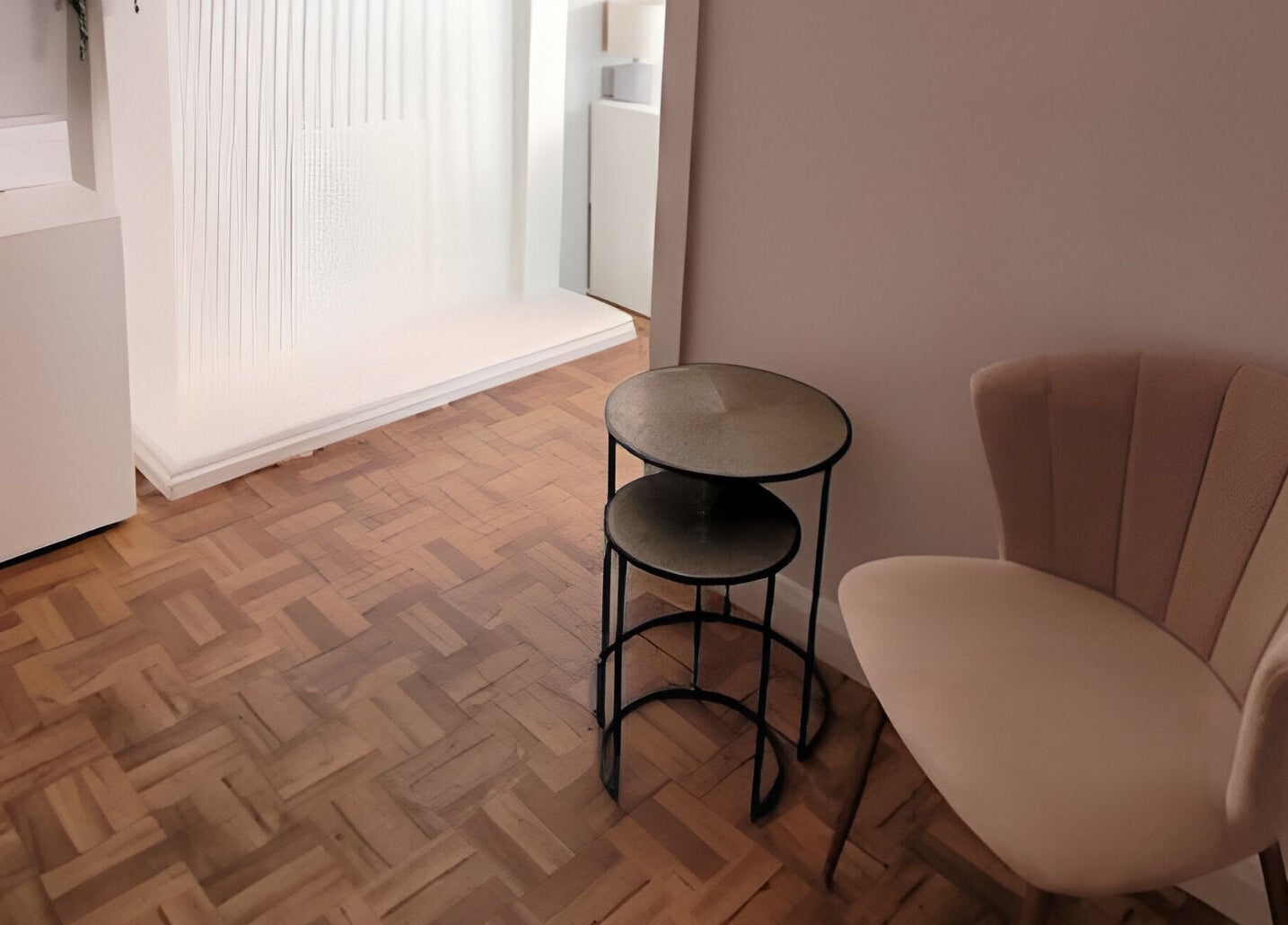 Elegant seating at Nirvana Beauty & Massage, Bonnybridge, Scotland, GB, featuring a stylish chair and table.