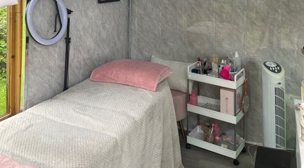 Cozy treatment room at Martindale Nails, Kendal, England, GB, with a plush bed and beauty tools.
