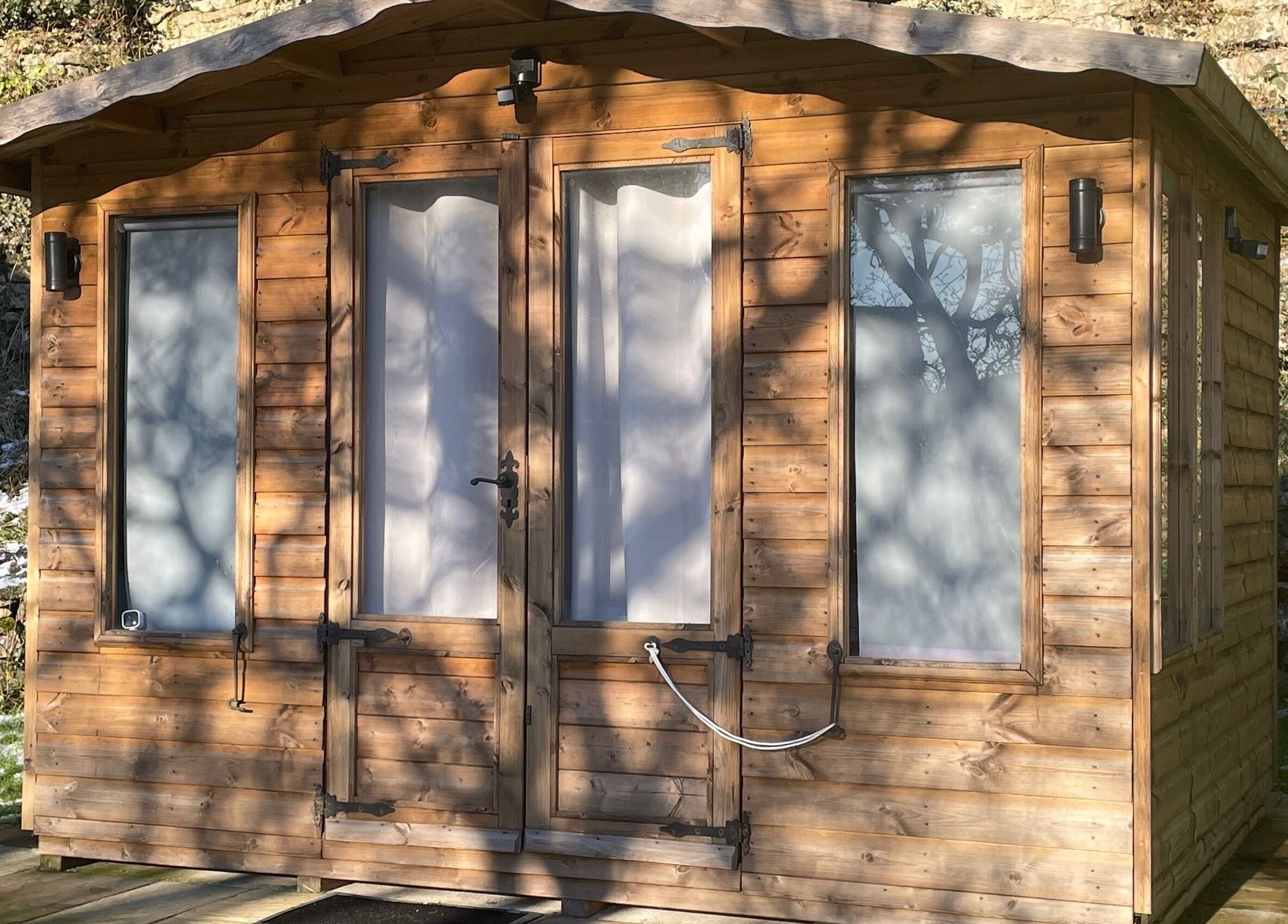 Cozy wooden cabin at Martindale Nails, Kendal, England, GB, surrounded by nature, offering a tranquil retreat.