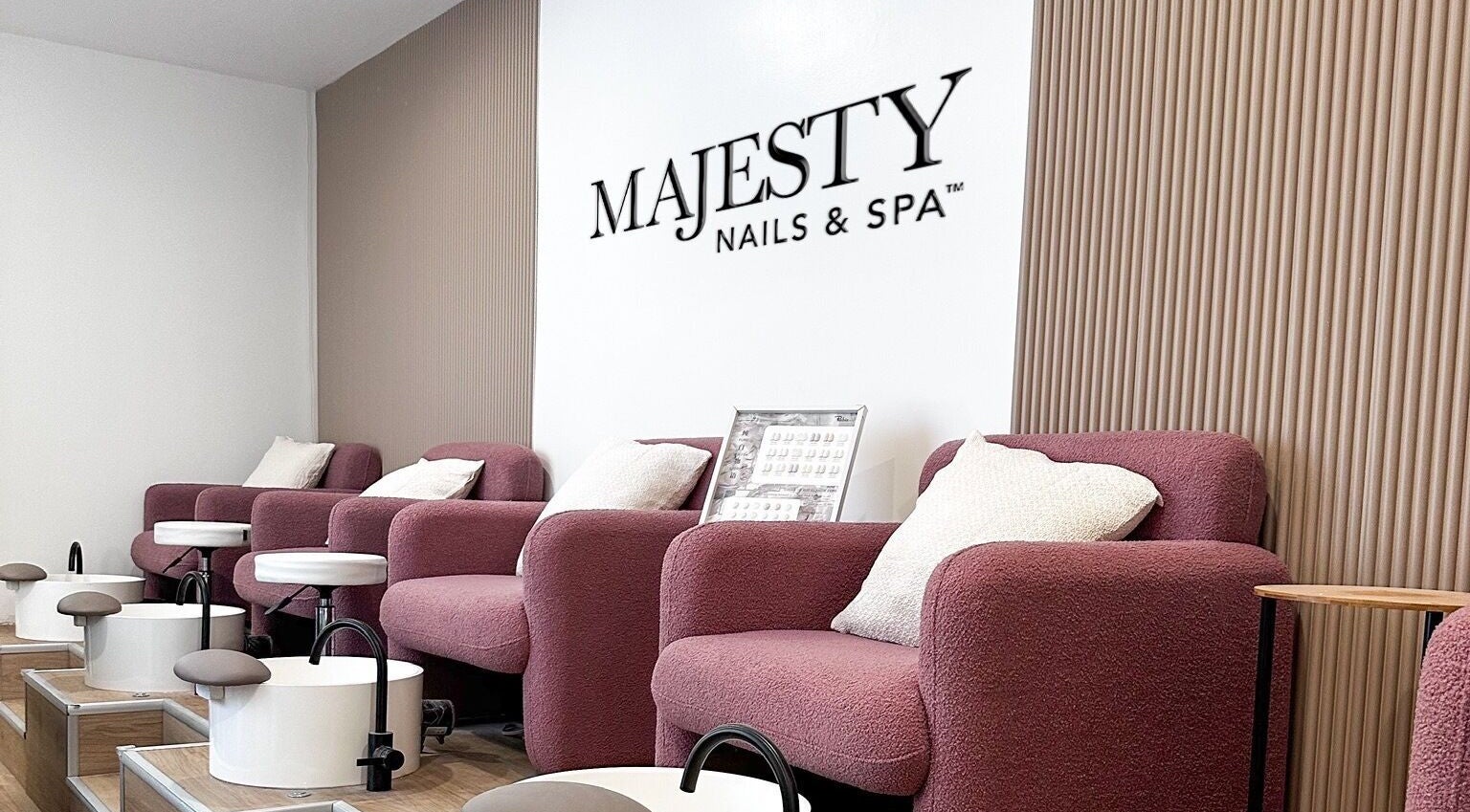 Cozy pedicure area at Majesty Nails and Spa, Calgary, Alberta, CA with plush chairs and foot baths.