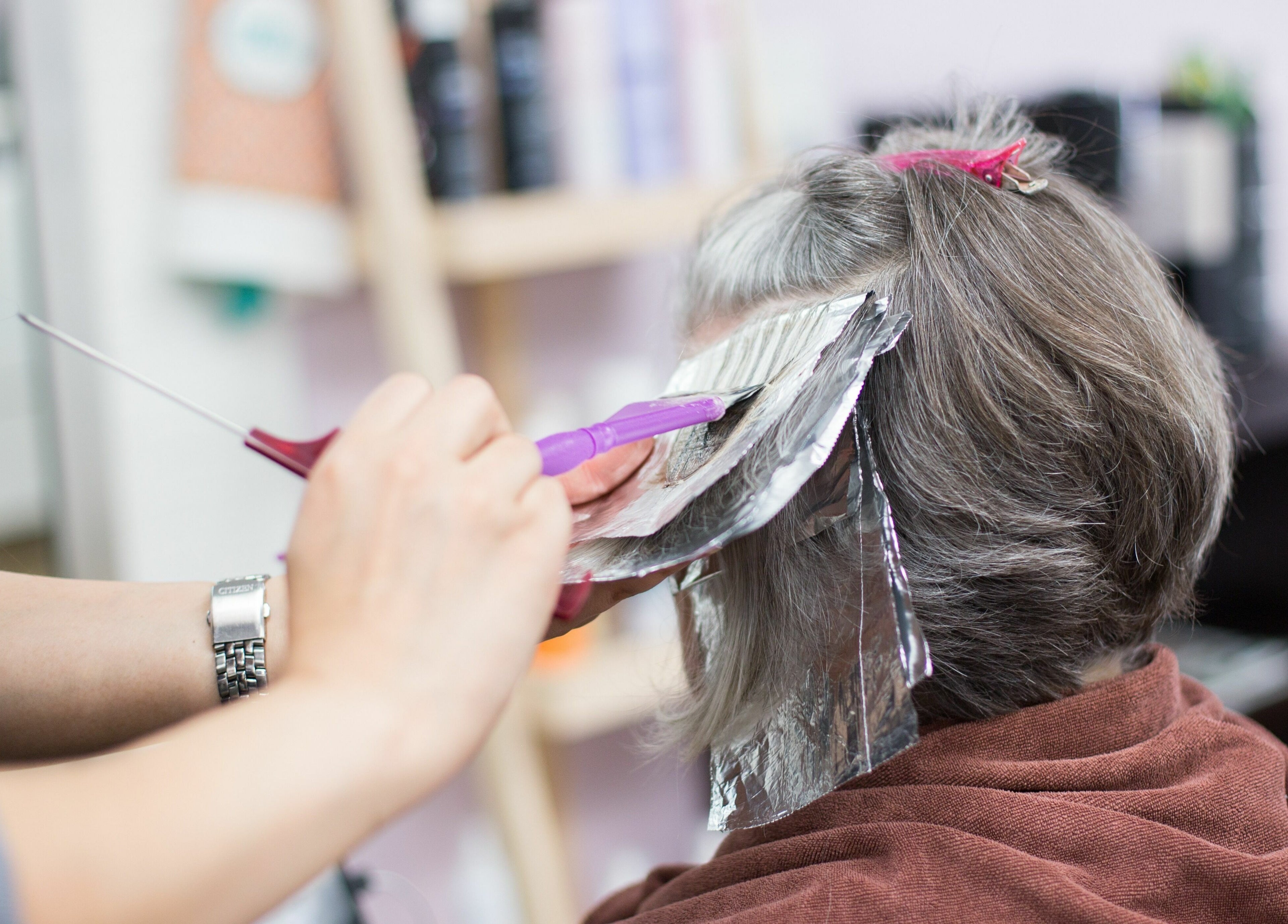 Hair coloring in progress at JPL Hair Studio, Langley, British Columbia, CA, showcasing expert gray blending.