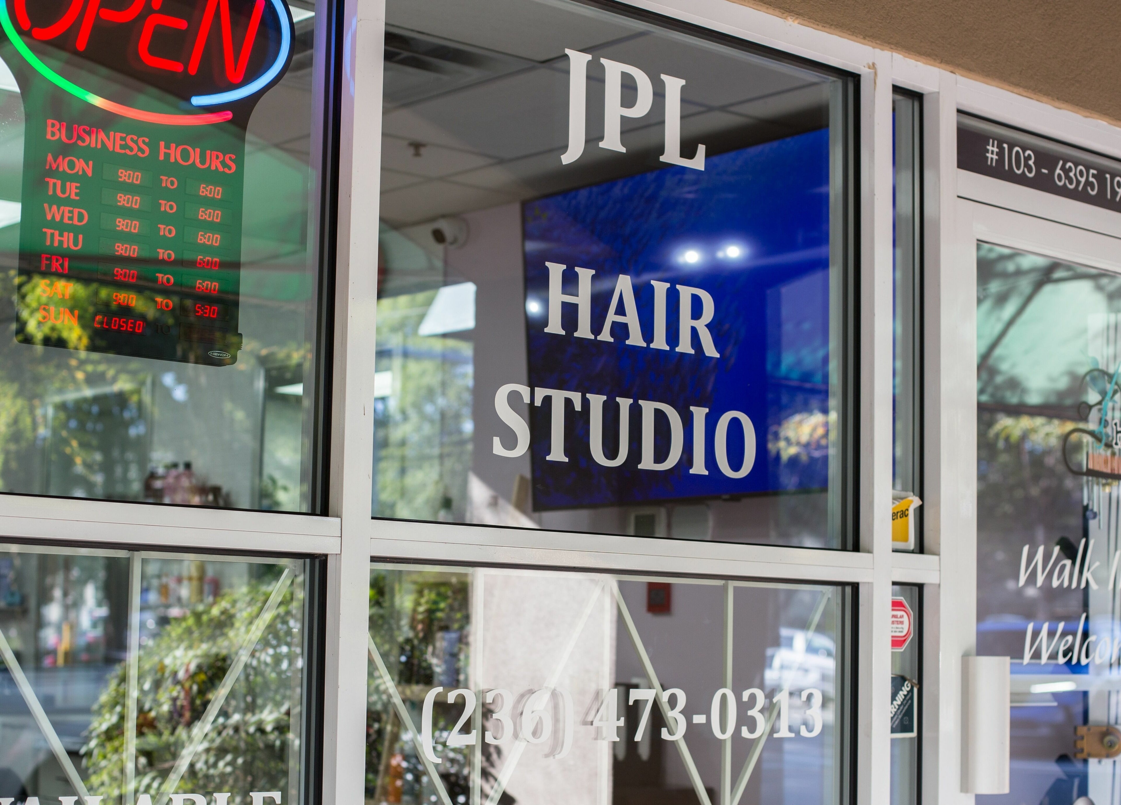 Exterior view of JPL Hair Studio entrance in Langley, British Columbia, CA.