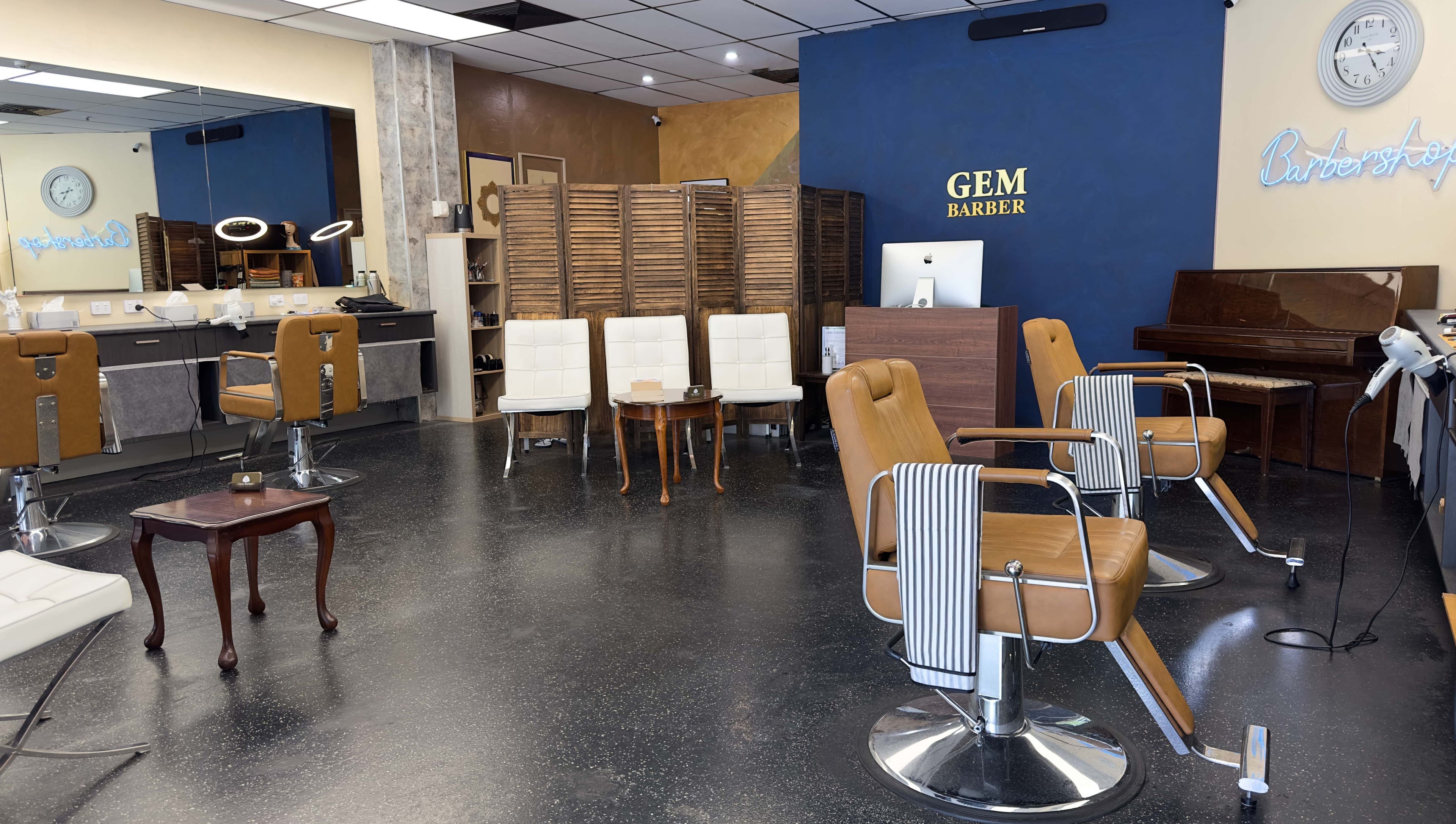 Interior of Gem Barber in Canberra, Australian Capital Territory, AU with stylish chairs and modern design.