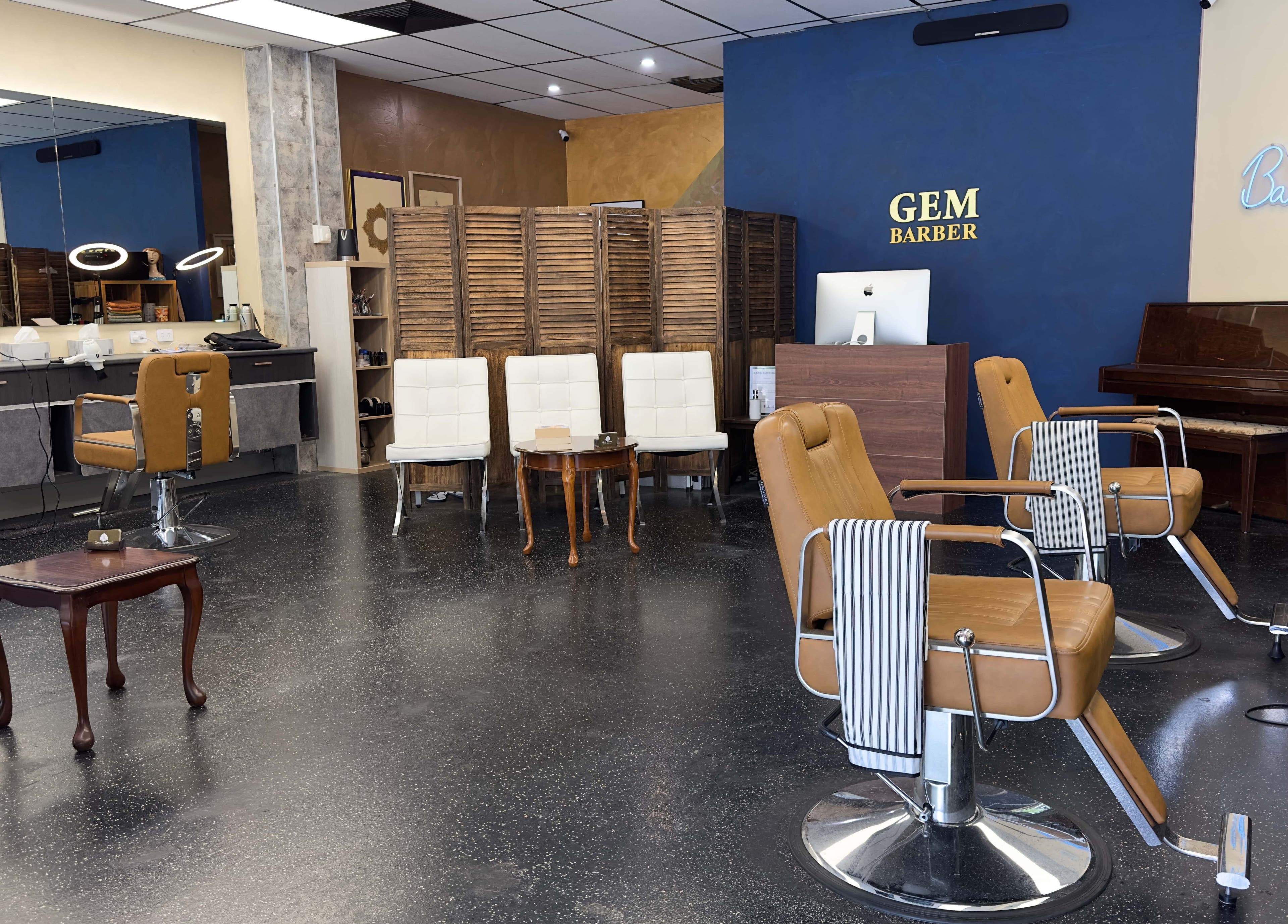 Interior of Gem Barber in Canberra, Australian Capital Territory, AU with stylish chairs and modern design.
