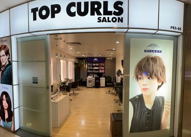Entrance of Topcurls Salon, a stylish beauty venue in Singapore, Singapore, SG with sleek interior and welcoming vibe.