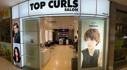 Entrance of Topcurls Salon, a stylish beauty venue in Singapore, Singapore, SG with sleek interior and welcoming vibe.