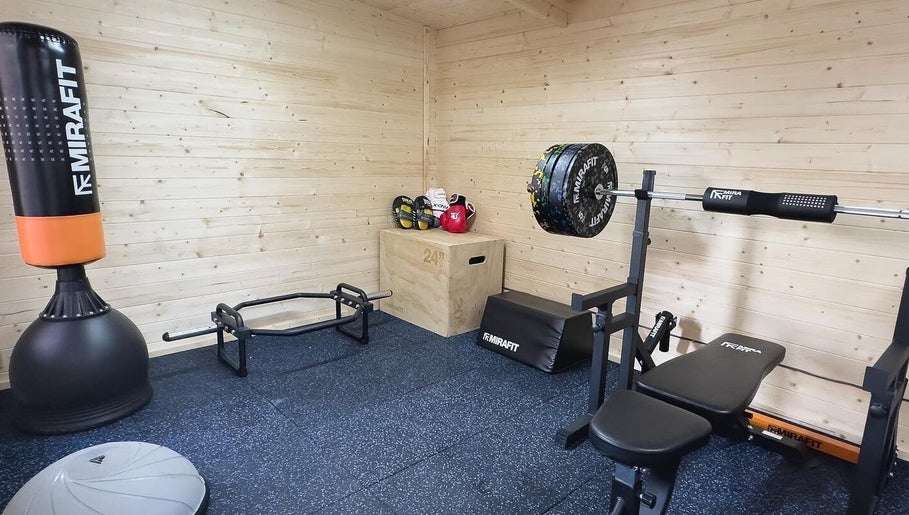Training corner at The Strength Studio & Sports Massage in Eastleigh, England, GB with fitness equipment.