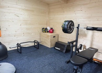 Training corner at The Strength Studio & Sports Massage in Eastleigh, England, GB with fitness equipment.