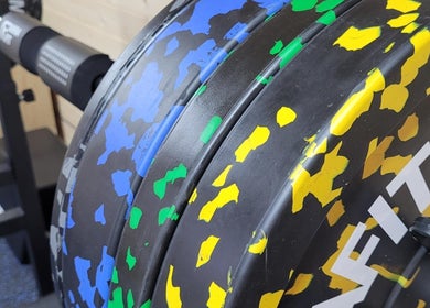 Colorful weight plates at The Strength Studio & Sports Massage, Eastleigh, England, GB.