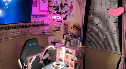 A trendy nail studio at Em Thee Tech in Sugarhouse, South Salt Lake, Utah, US with vibrant decor and nail polish display.