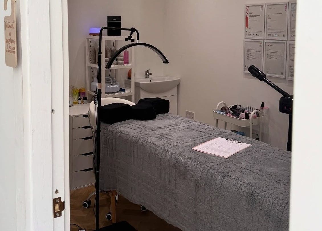 Cozy treatment room at Miracles Beauty Salon, Brighouse, England, GB, with a prepared massage table.