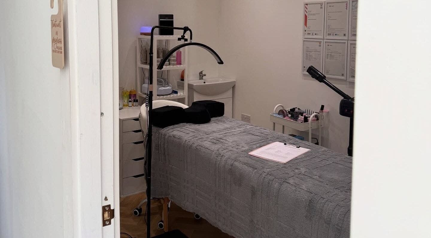 Cozy treatment room at Miracles Beauty Salon, Brighouse, England, GB, with a prepared massage table.