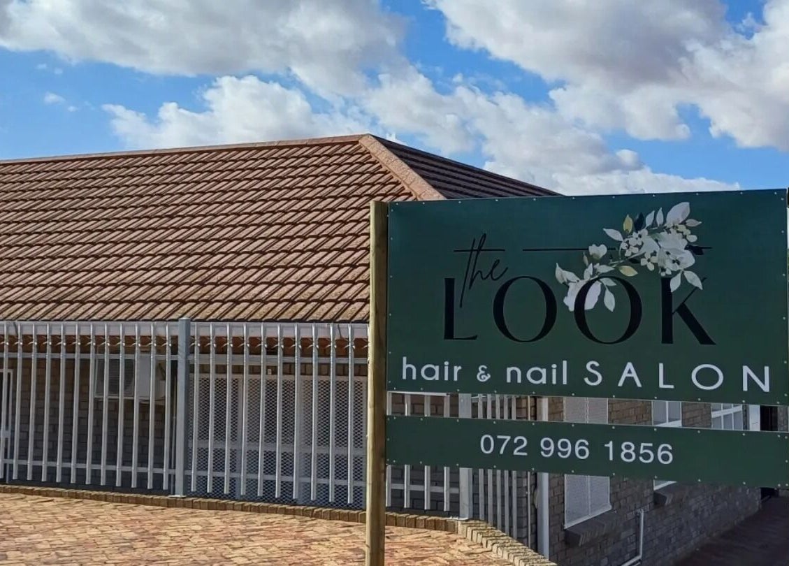 Exterior view of The Look Hair & Nail Salon @ Vredendal, showcasing its stylish signage in Vredendal, Western Cape, ZA.