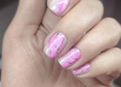 Close-up of artistic pink nail design at Studio 59, Rumney, Wales, GB, showcasing intricate artistry.