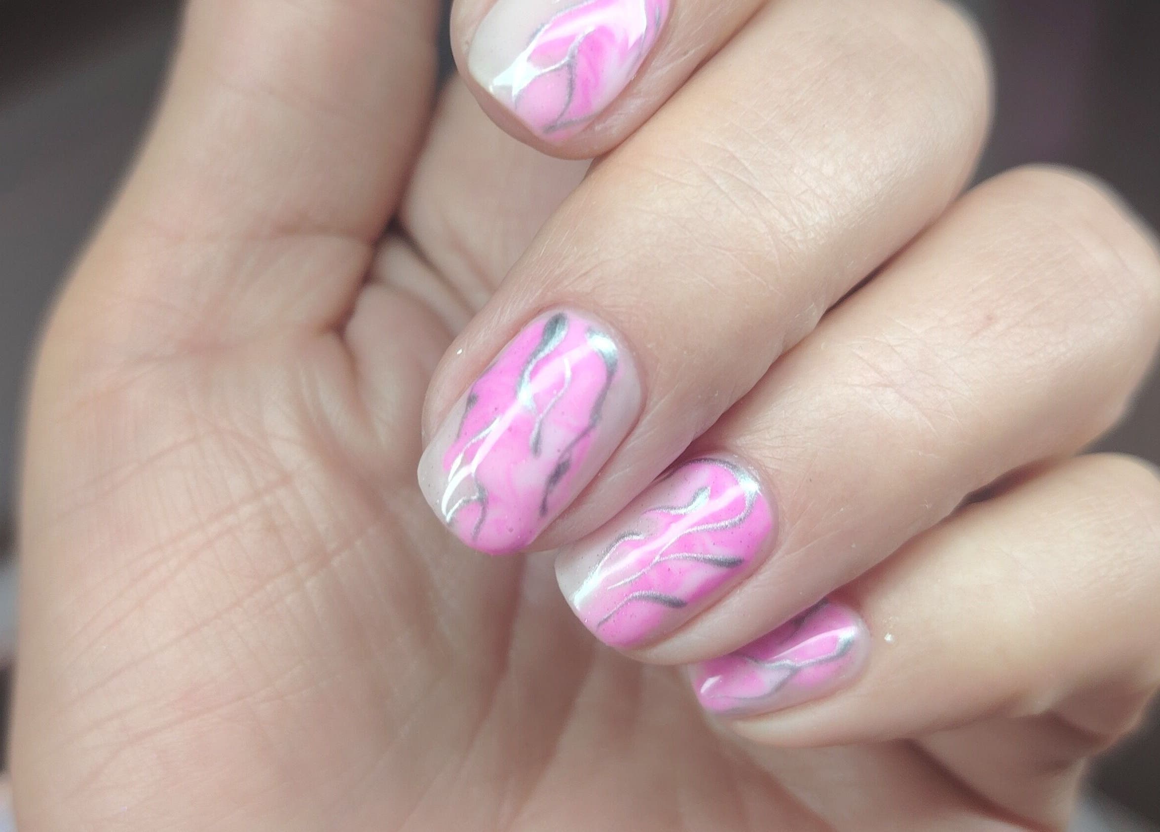 Pink and silver nail art at Studio 59 Pro Cosmetology, Microblading & Body Piercing in Rumney, Wales, GB.